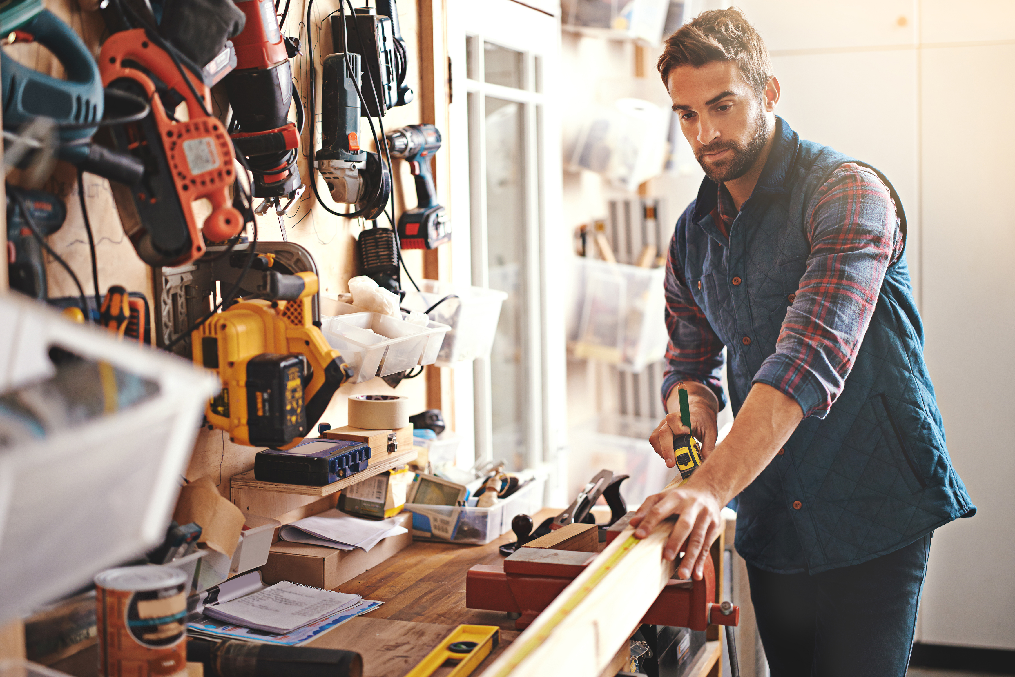 Man working on project in his home garage.