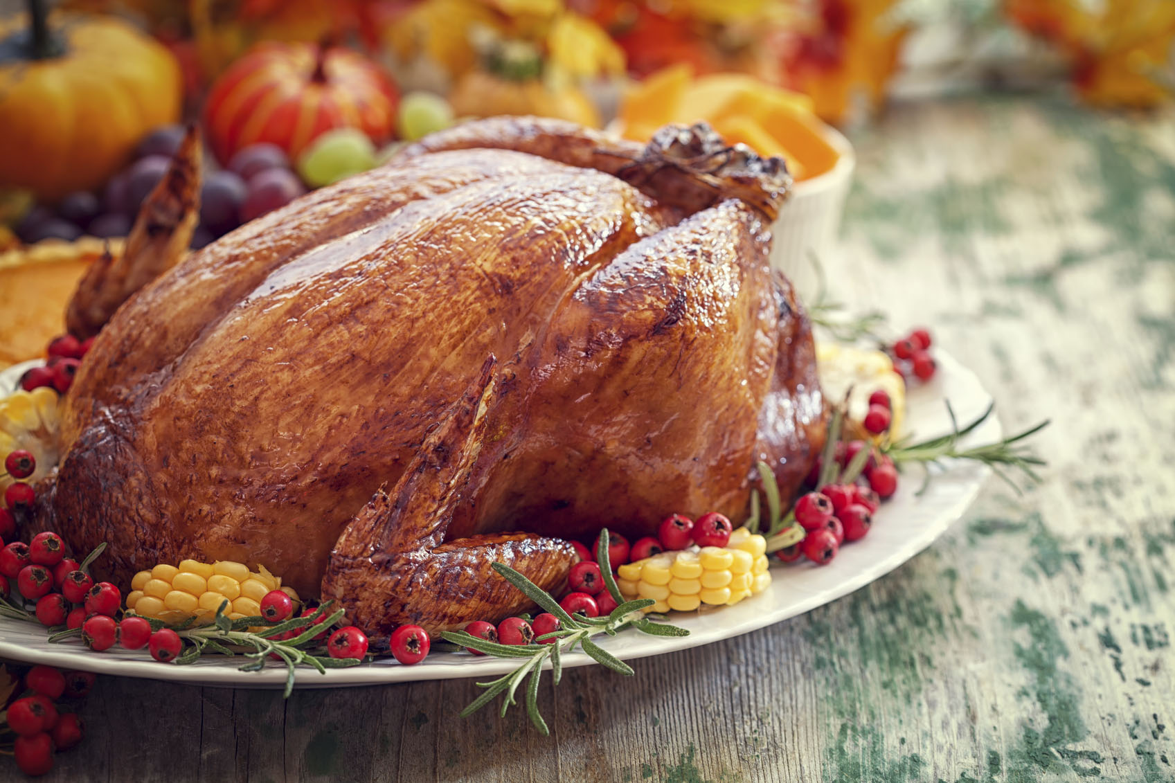 Golden-brown turkey on a serving platter.